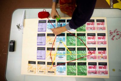 a board game designed to decide collaboratively the media and data used by IAQOS